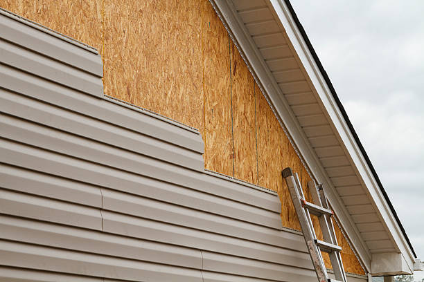 Professional Siding Repair technician working in Carmichaels, PA